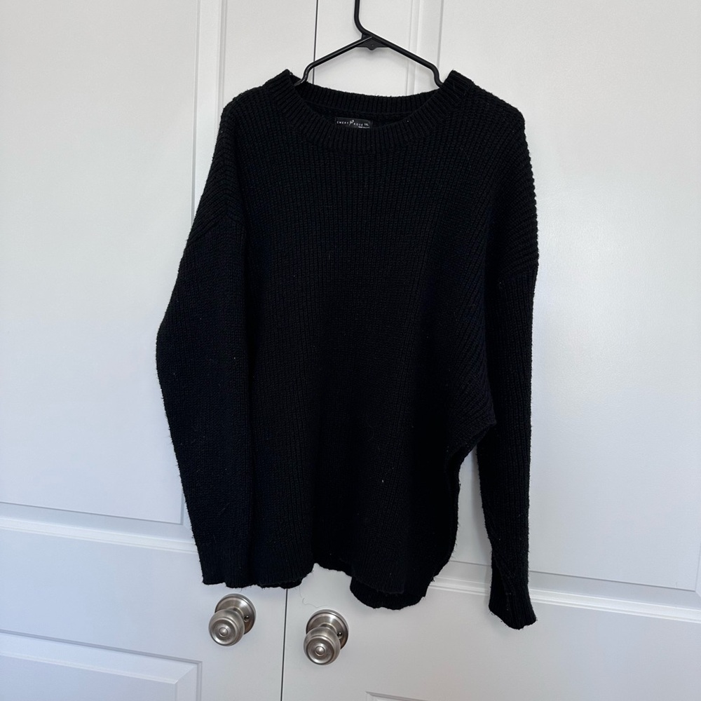 Black knit sweater with side slit